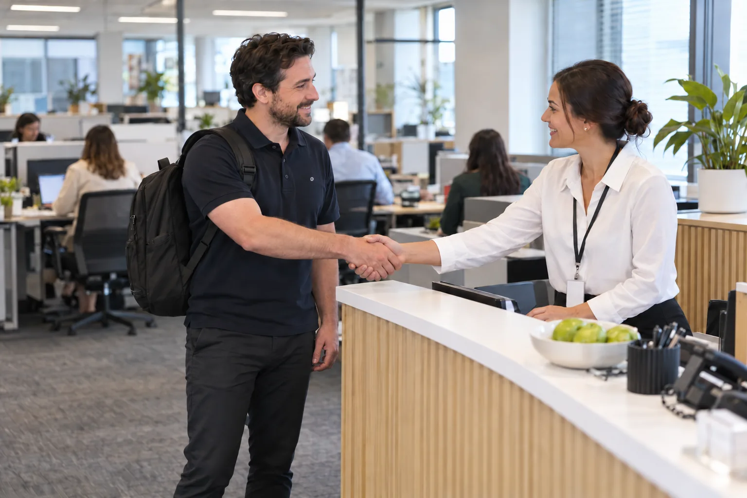 IT technician arriving to help an office manager in Brisbane